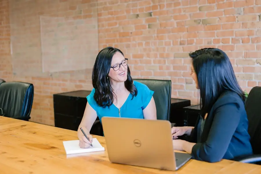 Application documents being reviewed at a table